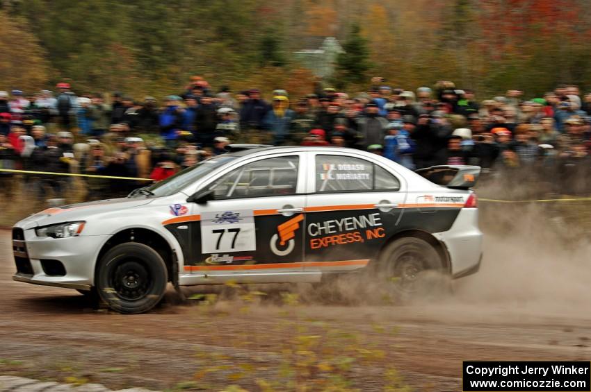 Vio Dobasu / Keith Moriarty Mitsubishi Lancer Evo X comes through the SS1 (Green Acres I) spectator area.