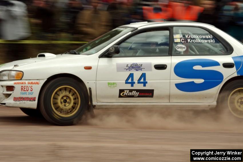 Henry Krolikowski / Cindy Krolikowski Subaru Impreza comes through the SS1 (Green Acres I) spectator area.