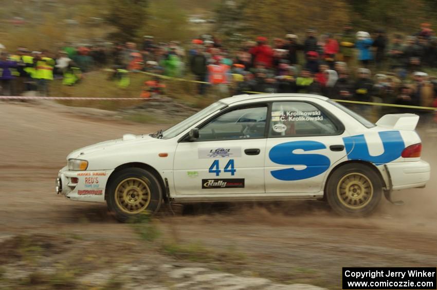 Henry Krolikowski / Cindy Krolikowski Subaru Impreza comes through the SS1 (Green Acres I) spectator area.