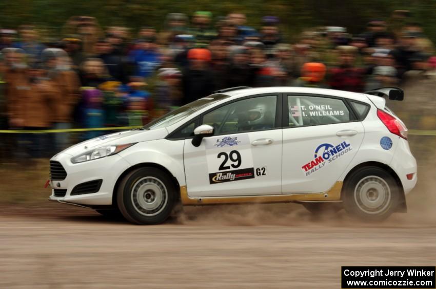 Tim O'Neil / Ian Williams Ford Fiesta R2 comes through the SS1 (Green Acres I) spectator area.