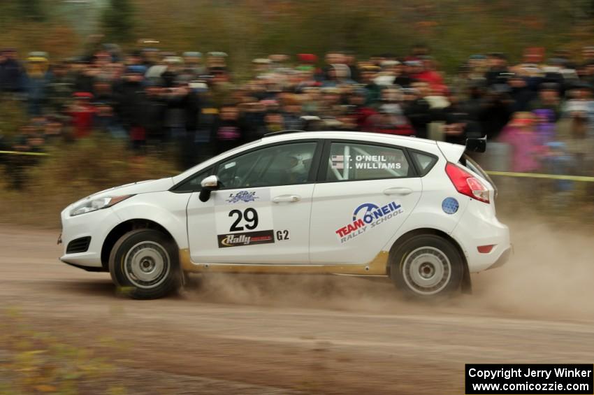 Tim O'Neil / Ian Williams Ford Fiesta R2 comes through the SS1 (Green Acres I) spectator area.