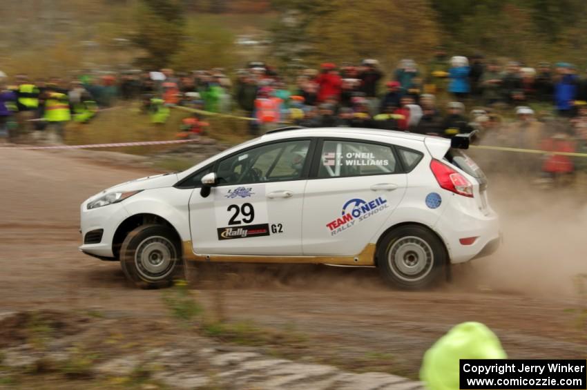 Tim O'Neil / Ian Williams Ford Fiesta R2 comes through the SS1 (Green Acres I) spectator area.