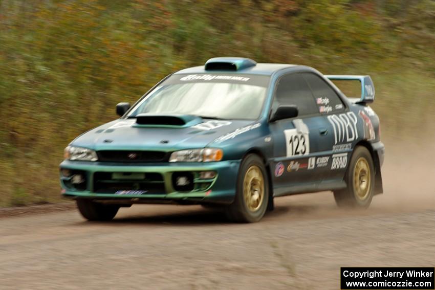 Mike Engle / Brian Arpke Subaru Impreza 2.5RS comes through the SS1 (Green Acres I) spectator area.