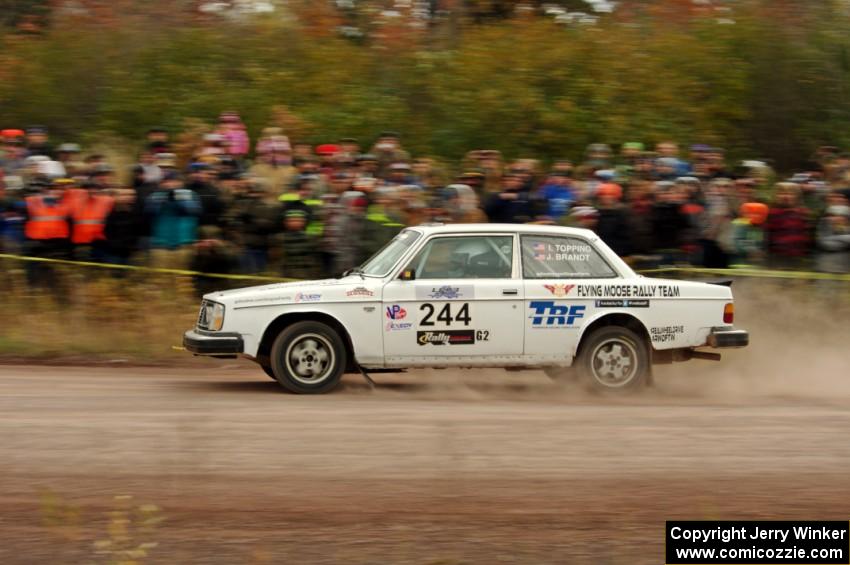 Ian Topping / Jimmy Brandt Volvo 242 comes through the SS1 (Green Acres I) spectator area.