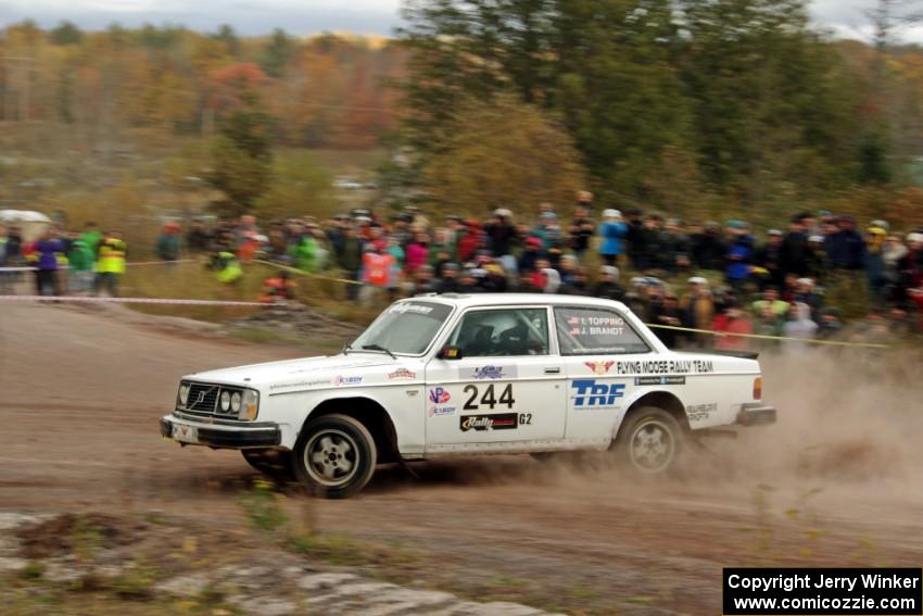 Ian Topping / Jimmy Brandt Volvo 242 comes through the SS1 (Green Acres I) spectator area.