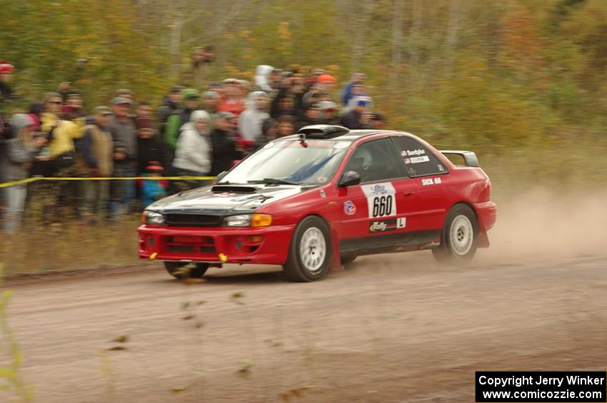 Chuck Surdyke / Colin Vickman Subaru Impreza comes through the SS1 (Green Acres I) spectator area.