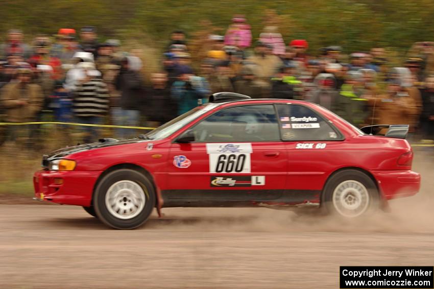 Chuck Surdyke / Colin Vickman Subaru Impreza comes through the SS1 (Green Acres I) spectator area.