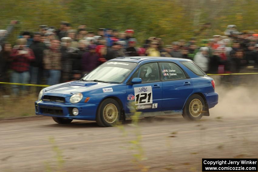 Nate Usher / Aaron Usher Subaru WRX Wagon comes through the SS1 (Green Acres I) spectator area.