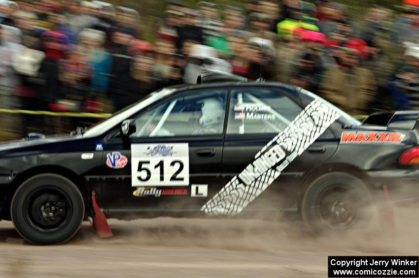 Corey Holmes / Dustin Masters Subaru Impreza comes through the SS1 (Green Acres I) spectator area.