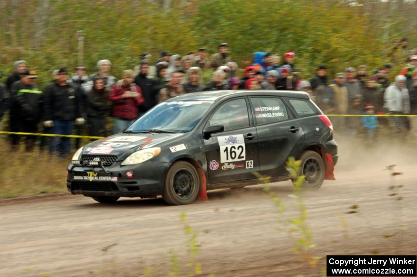 Kyle Steinkamp / Spencer Wasilewski Toyota Matrix comes through the SS1 (Green Acres I) spectator area.