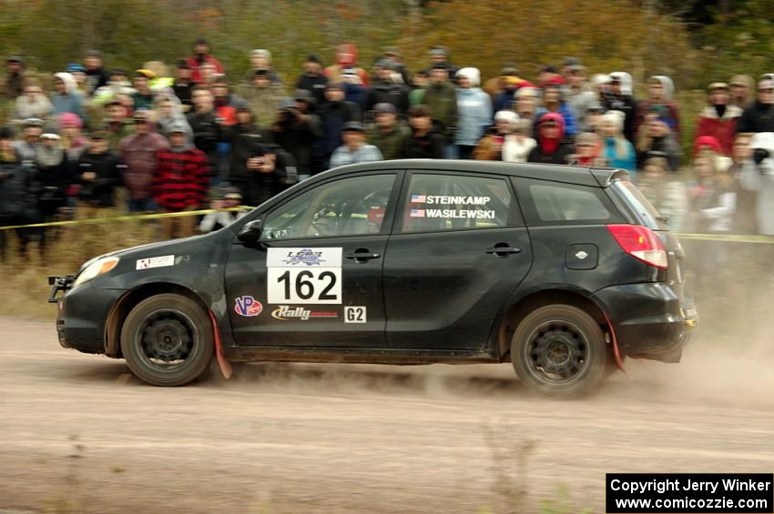 Kyle Steinkamp / Spencer Wasilewski Toyota Matrix comes through the SS1 (Green Acres I) spectator area.