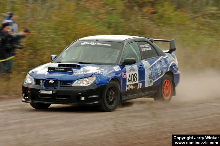 Mitchell Kelly / Weston Bailey Subaru Impreza comes through the SS1 (Green Acres I) spectator area.