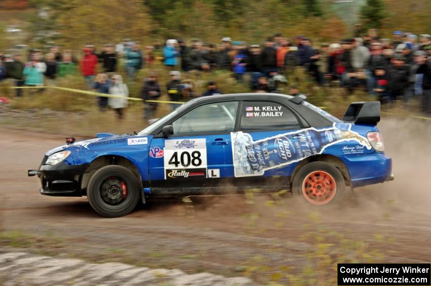 Mitchell Kelly / Weston Bailey Subaru Impreza comes through the SS1 (Green Acres I) spectator area.