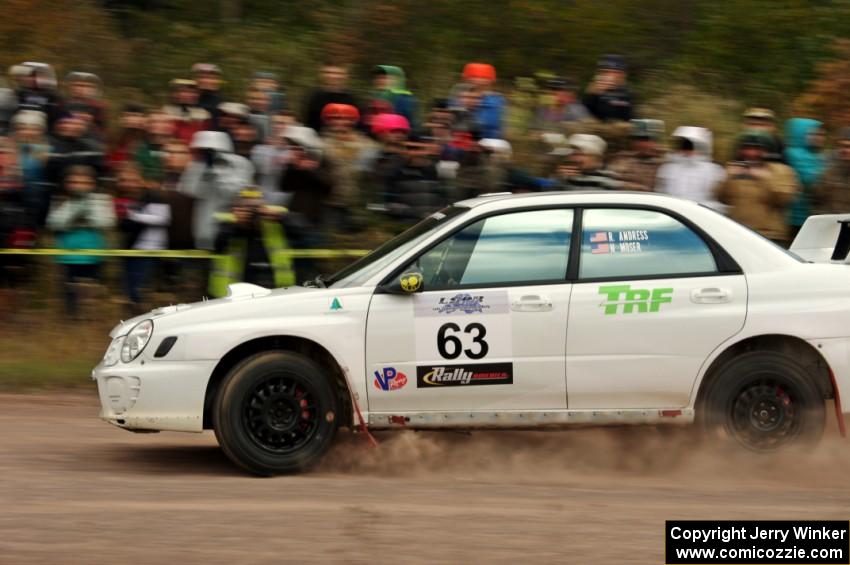 Reid Andress / Neil Moser Subaru WRX comes through the SS1 (Green Acres I) spectator area.