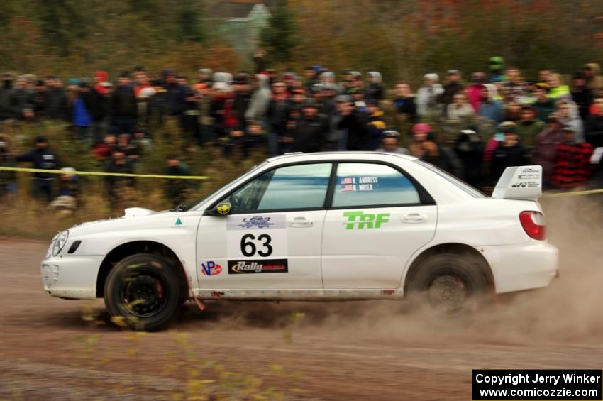 Reid Andress / Neil Moser Subaru WRX comes through the SS1 (Green Acres I) spectator area.