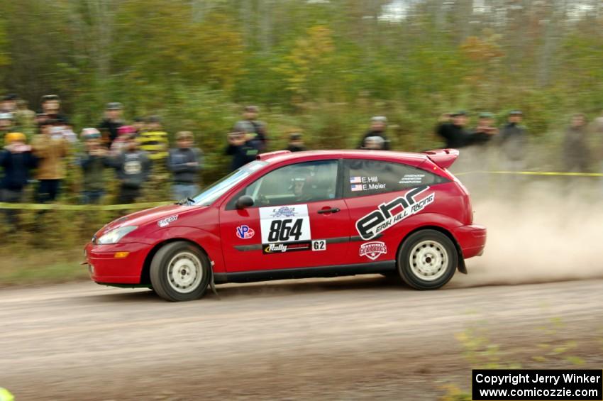 Erik Hill / Erica Meier Ford Focus comes through the SS1 (Green Acres I) spectator area.