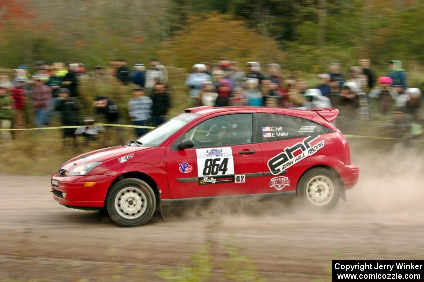 Erik Hill / Erica Meier Ford Focus comes through the SS1 (Green Acres I) spectator area.