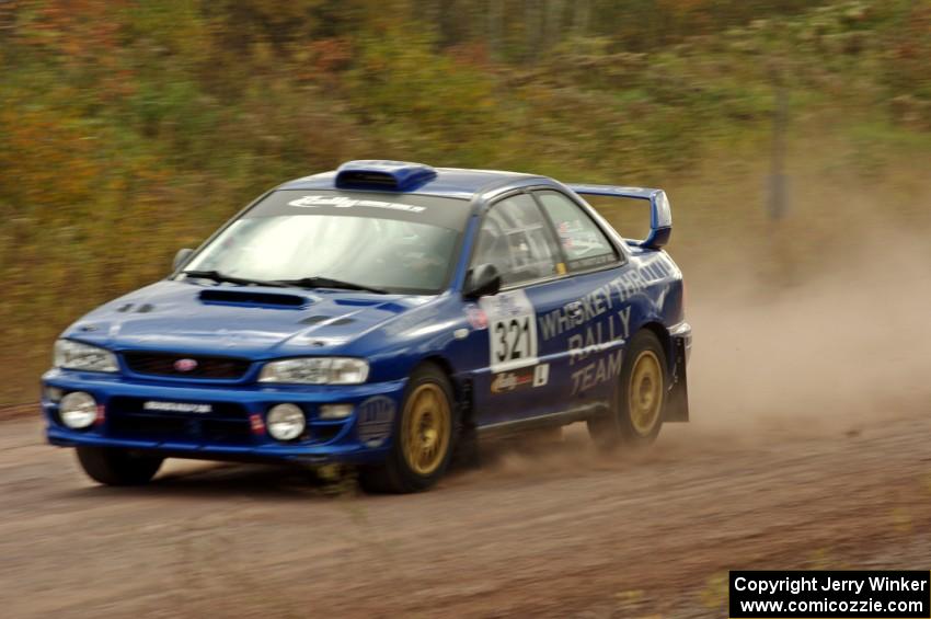 Nate Ellis / Steven Phillips Subaru Impreza 2.5RS comes through the SS1 (Green Acres I) spectator area.