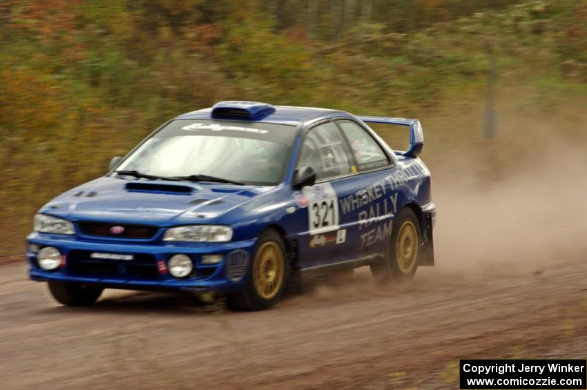 Nate Ellis / Steven Phillips Subaru Impreza 2.5RS comes through the SS1 (Green Acres I) spectator area.