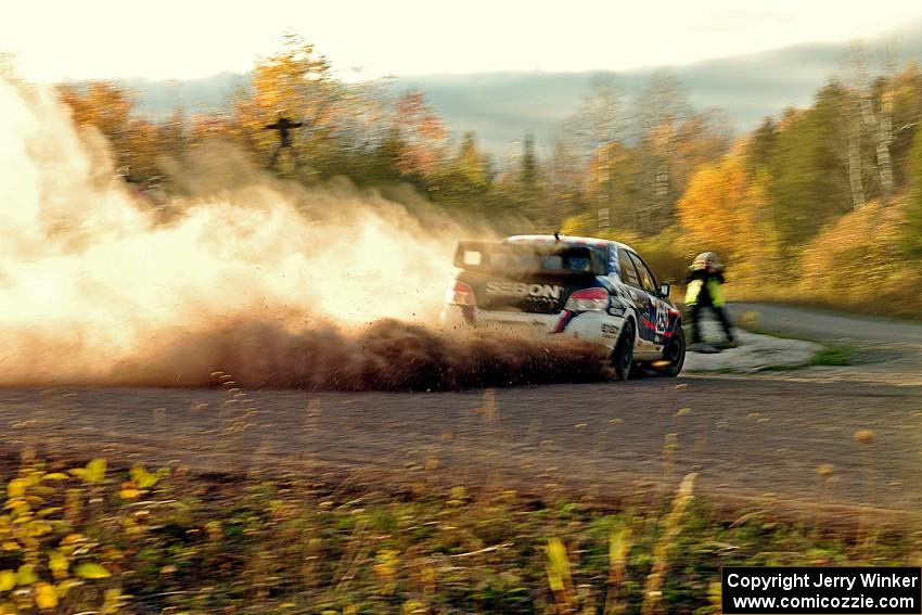 Adam Yeoman / Jordan Schulze Subaru WRX STi comes through the SS15 (Green Acres II) spectator area.