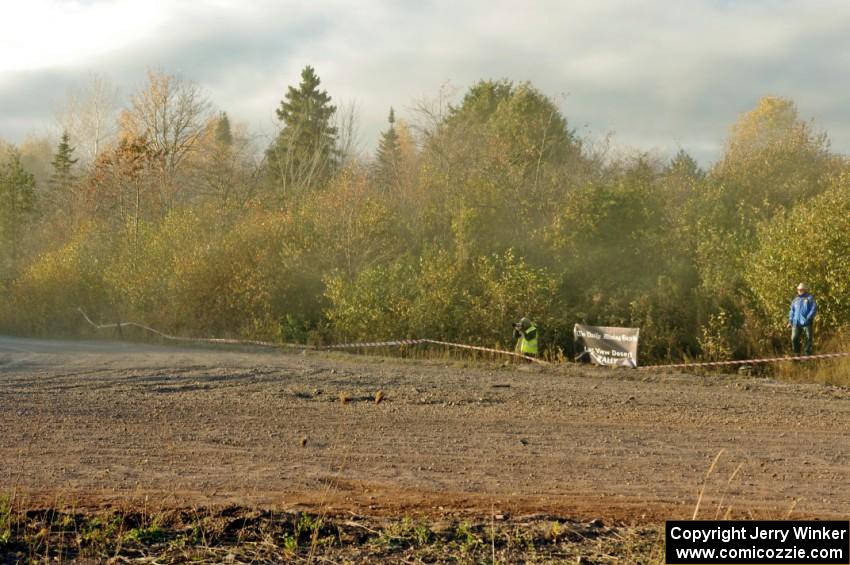 Photographer Arthur Partyka and Mariusz Malik at the SS15 (Green Acres II) spectator area.