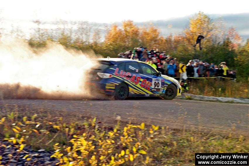 Lauchlin O'Sullivan / Scott Putnam Subaru WRX STi comes through the SS15 (Green Acres II) spectator area.