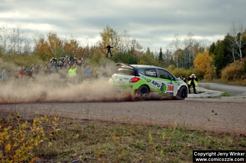 Arkadiusz Gruszka / Lukasz Wronski Mitsubishi Mirage RS comes through the SS15 (Green Acres II) spectator area.