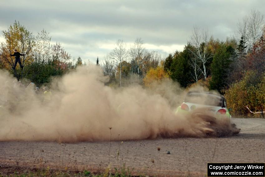 Arkadiusz Gruszka / Lukasz Wronski Mitsubishi Mirage RS comes through the SS15 (Green Acres II) spectator area.