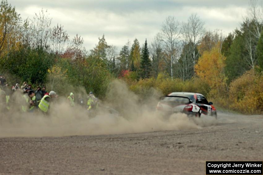 Adam Short / Danny Norkus Subaru WRX comes through the SS15 (Green Acres II) spectator area.