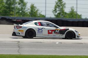 Mauro Trentin's Maserati Trofeo goes wide at turn one.