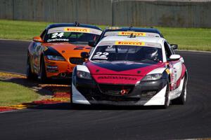 Kevin Anderson's Mazda RX-8, Gino Carini's Mazda RX-8 and Toby Grahovec's BMW Z4