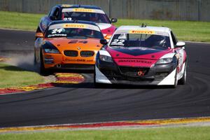 Kevin Anderson's Mazda RX-8, Toby Grahovec's BMW Z4 and Gino Carini's Mazda RX-8