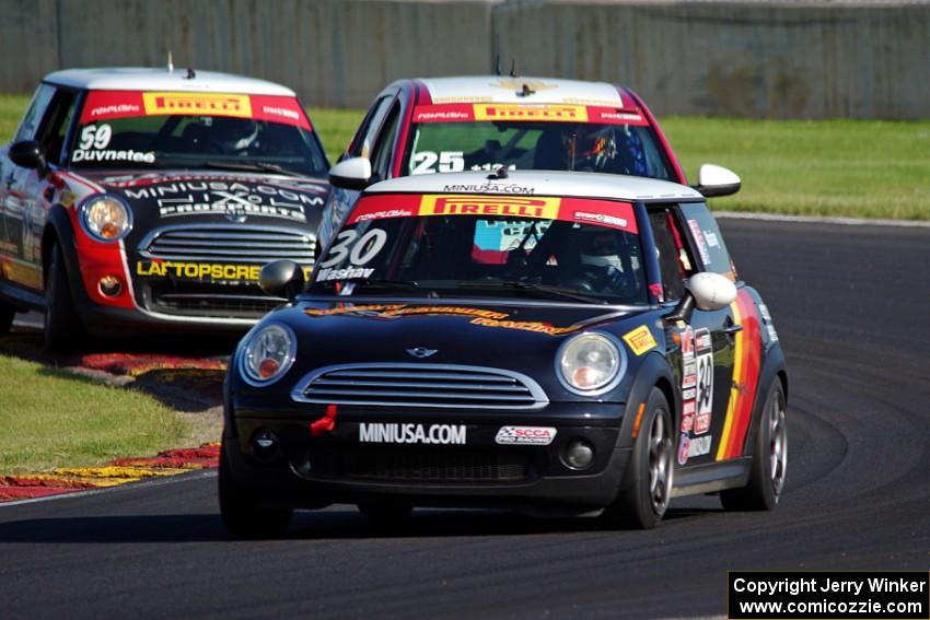 Travis Washay's MINI Cooper, Johan Schwartz's Chevy Sonic and Nic Duynstee's MINI Cooper