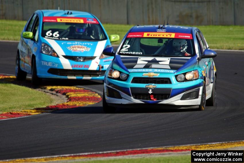 Van Svenson's Chevy Sonic and Randy Smith's Honda Fit