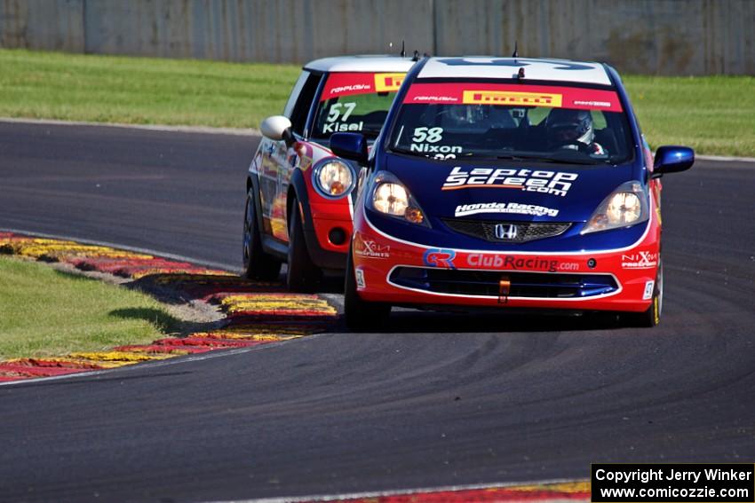 Glenn Nixon's Honda Fit and Andrei Kisel's MINI Cooper