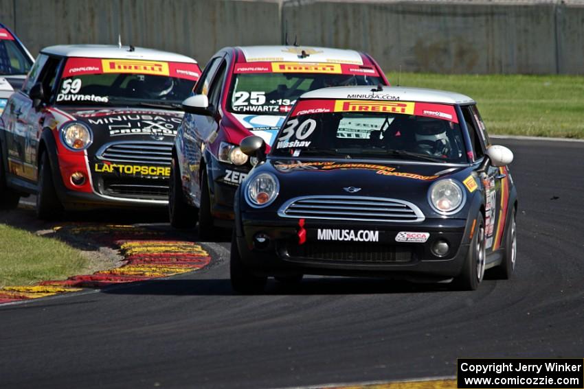 Travis Washay's MINI Cooper, Johan Schwartz's Chevy Sonic and Nic Duynstee's MINI Cooper