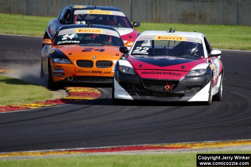 Kevin Anderson's Mazda RX-8, Toby Grahovec's BMW Z4 and Gino Carini's Mazda RX-8