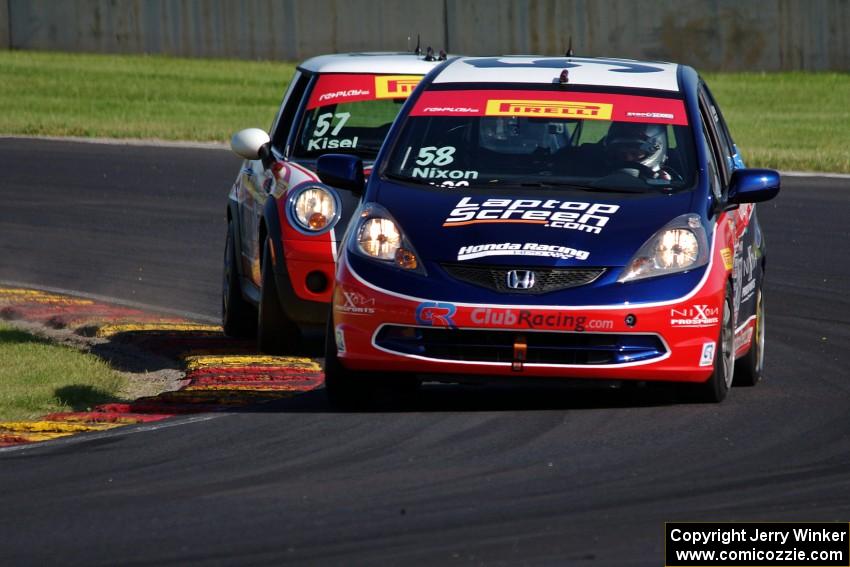 Glenn Nixon's Honda Fit and Andrei Kisel's MINI Cooper