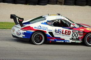 Corey Fergus' Porsche Cayman has a flat mid-race.