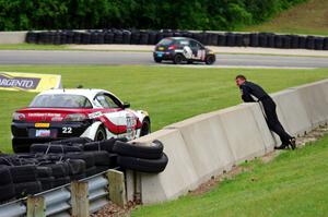 Kevin Anderson pulled his Mazda RX-8 off just after turn 6.