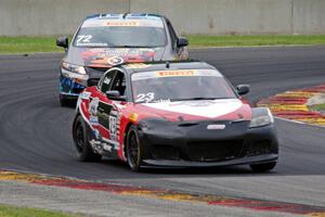 Gino Carini's Mazda RX-8 and Emilee Tominovich's Honda Civic Si