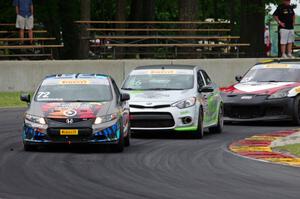 Emilee Tominovich's Honda Civic Si, Jason Wolfe's Kia Forte Koup and Gino Carini's Mazda RX-8