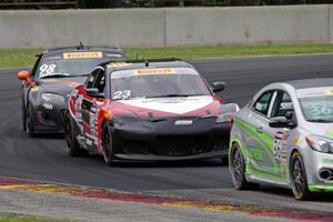 Jason Wolfe's Kia Forte Koup, Gino Carini's Mazda RX-8 and Ernie Francis, Jr.'s Mazda MX-5