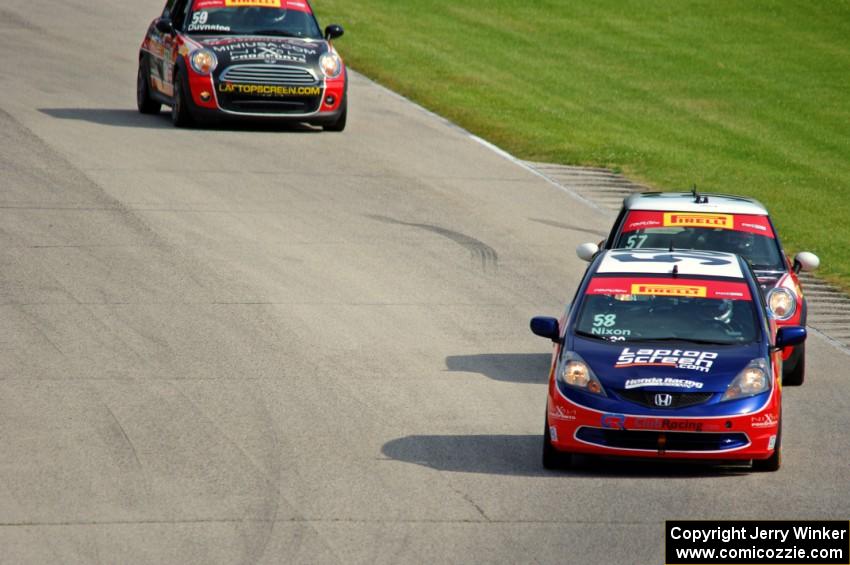 Glenn Nixon's Honda Fit, Andrei Kisel's MINI Cooper and Nic Duynstee's MINI Cooper