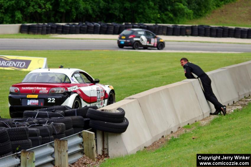 Kevin Anderson pulled his Mazda RX-8 off just after turn 6.