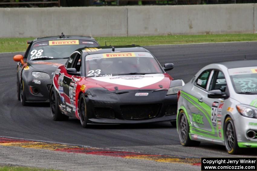 Jason Wolfe's Kia Forte Koup, Gino Carini's Mazda RX-8 and Ernie Francis, Jr.'s Mazda MX-5