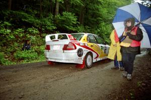 Frank Sprongl / Dan Sprongl Mitsubishi Lancer Evo IV at the start of the rainy Friday practice stage.