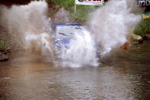 Mark Lovell / Mike Kidd Subaru WRX STi at the flying finish of Stony Crossing, SS1.