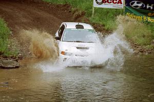 Tom Lawless / Brian Sharkey Mitubishi Lancer Evo IV at the flying finish of Stony Crossing, SS1.