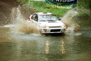 Henry Krolikowski / Cindy Krolikowski Subaru WRX STi at the flying finish of Stony Crossing, SS1.